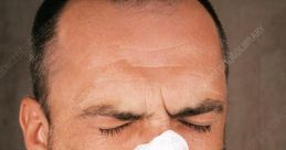 Man Sneezes and Sprays Water
