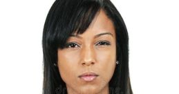 Serious expression of a Black woman, showcasing strength and determination, embodying resilience and empowerment.