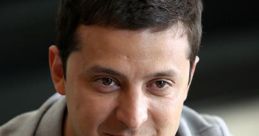 Vladimir Zelensky smiling in a casual outfit, showcasing his approachable personality and charisma.