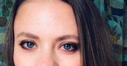 Celebrity Psychic Lana with captivating blue eyes, soft makeup, and flowing hair, exuding confidence and mystery.
