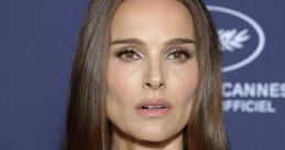 Natalie Portman at a glamorous event, showcasing her elegant style with a sequined dress and stunning necklace.