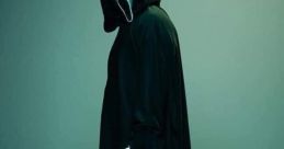 GhostFace stands ominously in a dark cloak, gripping a knife, embodying the essence of horror and suspense.
