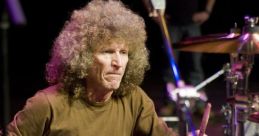 Tommy Aldridge Type your text to hear it in the voice of Tommy Aldridge. The whirring of the computer fan fills the room