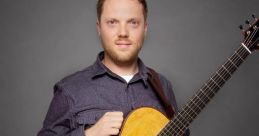 Trevor Gordon Hall Type your text to hear it in the voice of Trevor Gordon Hall. The soothing strumming of a guitar fills