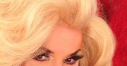 Wendy impersonator showcasing glamorous makeup and stylish blonde curls, ready to entertain with vibrant personality.