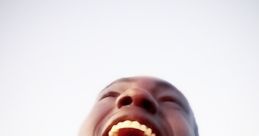 Joyful expression of a young man passionately celebrating life, embodying the spirit of Buddy DML Unlimited Forever.