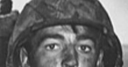 Soldier wearing a helmet, showing determination and grit, with a dirty face capturing the intensity of battle or training.