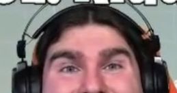 Xiuder, popular Italian YouTuber, smiles while gaming, showcasing his energetic personality and passion for content creation.