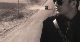 Vĩnh Hưng in stylish black attire on a desolate road, showcasing the essence of Lạc Mất Em (Vol. 10 - 2007).