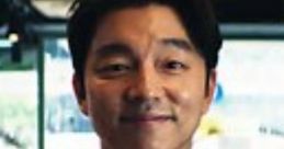 Smiling recruiter in a suit, representing Fromuid Games, stands confidently in a modern office environment.