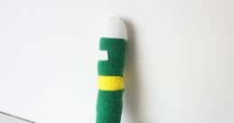 Plush toy resembling Gotta Sweep, featuring a colorful broom design perfect for fans and collectors of game merchandise.