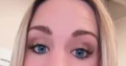 Kimberlee Hillner passionately expressing her views on confrontational topics, showcasing bright blue eyes and blonde hair.