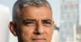Sadiq Khan in a formal suit, confidently posing against a city skyline backdrop, showcasing leadership and ambition.