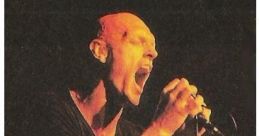 Merely an Australian Chap Clutching a Microphone