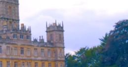 Highclere Castle, setting of Downton Abbey, showcases its stunning architecture and manicured gardens in Trailer 1 scenes.