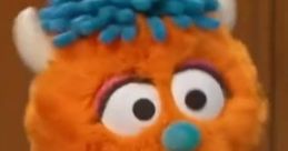 Rudy from Sesame Street, featuring his playful expressions in star-patterned pajamas, showcasing his unique character charm.