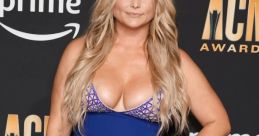 Miranda Lambert radiates elegance in a stunning blue gown at the ACM Awards, showcasing her signature style and confidence.