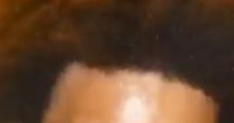 Excited expression of a man with curly hair, often associated with the meme culture around "Trihard n.