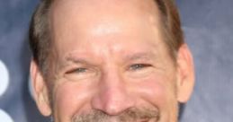 Smiling Bill Cowher at an event, showcasing his iconic look and charismatic personality. NFL coach and sports analyst.