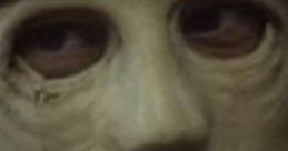Close-up of The Man from Hush (2016), showcasing a haunting expression and distinctive mask, enhancing suspense and horror.