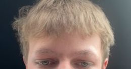 Young male with short hair and serious expression. Captured in a car setting. Potentially linked to Cruz Streamer.