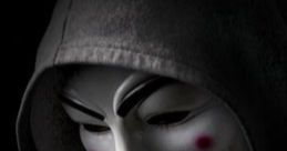 Mysterious figure in a hooded sweatshirt wearing a Guy Fawkes mask, symbolizing resistance and anonymity.