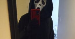 Ghostface costume featuring Vito Prete's iconic mask, holding a knife in a mirror selfie. Perfect for Halloween enthusiasts.