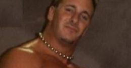 Danny Doring showcasing muscular physique and championship belts, embodying the spirit of professional wrestling.