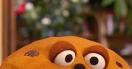 Mr. Crumb, the lovable cookie character from The Furchester Hotel, shows his cheerful personality in this delightful close-up.