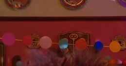Mr. Furball from The Furchester Hotel, with his signature fluffy fur and expressive eyes, in a colorful setting decorated with balloons.