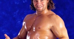 Val Venis, also known as Sean Morley, showing off his muscular physique with a thumbs-up and a confident smile.