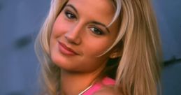 Tammy Lynn Sytch, also known as Sunny, poses in a striking pink top, showcasing her glamorous style and charm.