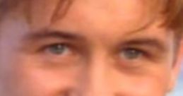 Smiling young man with bright blue eyes and styled hair, capturing a moment of happiness and charisma, possibly Mark Owen.