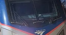 Amtrak ACS-64 locomotive number 618 at the station, showcasing modern train design and technology.