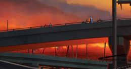 Lightning McQueen smiles confidently, showcasing his signature blue design against a vibrant sunset backdrop.