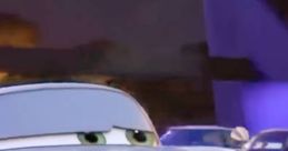 Finn McMissile, the charming spy car from Cars, shows off his sleek design and confident expression in a high-tech setting.