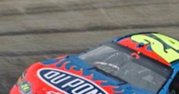Number 24 Jeff Gordon racing car with vibrant blue and red design, showcasing iconic DuPont sponsorship.