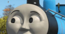 Smiling Edward from Thomas & Friends, showcasing his friendly personality against a vibrant background of trees.