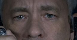 Tom Hanks as Captain Sullenberger in Sully (2016), conveying tension during a critical in-flight emergency call.