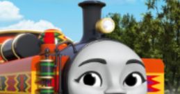 Nia from Thomas & Friends, vibrant red engine with a cheerful expression, set against a bright blue sky and lush greenery.