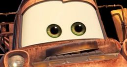 Smiling rusty tow truck character with big eyes, known for comedic moments in a beloved animated film series.