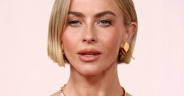 Julianne Hough showcases a stunning sequined dress and elegant jewelry at a glamorous event, highlighting her iconic style.