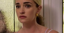Brianne Howey displays a concerned expression, wearing a stylish lavender top, highlighting her versatile acting skills.