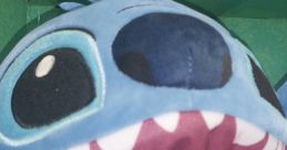 Close-up of a plush Stitch toy, showcasing its big eyes and toothy smile, perfect for "Stitch but my voice" moments.