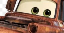 Cheerful Mater from Cars 3, a lovable rusty tow truck with big eyes and a wide smile, showcasing his charming personality.