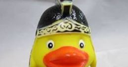 Duck wearing a black soldier's uniform and hat, featuring a bright yellow body and cheerful expression. Perfect for collectors!