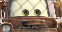 Smiling rusty tow truck with big teeth and expressive eyes, representing Mater from the popular "Cars" movie franchise.