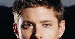 Close-up of Dean Winchester from Supernatural, showcasing his intense gaze and rugged style against a dark backdrop.
