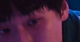 Close-up of a character from "Пак мин су" displaying intense emotions and suspenseful atmosphere in a dramatic scene.