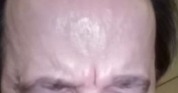 Close-up of a person displaying a serious expression, exploring themes of human emotion in Gabriele Marcotto 2.0 Version.